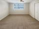 Large bedroom with neutral walls and carpet flooring at 3266 Henderson Mill Rd # C, Atlanta, GA 30341