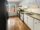 Kitchen boasts stainless steel appliances and hardwood floors at 3266 Henderson Mill Rd # C, Atlanta, GA 30341