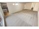 Bright dining room with carpet and view into kitchen at 3266 Henderson Mill Rd # C, Atlanta, GA 30341