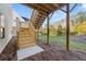 Wooden deck stairs leading to backyard at 739 Marlay Sw Ln, Powder Springs, GA 30127