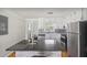 Modern kitchen with stainless steel appliances and an island at 107 Gladstone Sw Dr, Marietta, GA 30060