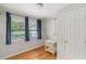 Bright home office with hardwood floors and built-in shelving at 107 Gladstone Sw Dr, Marietta, GA 30060