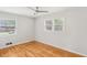 Bright bedroom with hardwood floors and ceiling fan at 107 Gladstone Sw Dr, Marietta, GA 30060
