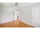 Bedroom with hardwood floors and access to hallway at 107 Gladstone Sw Dr, Marietta, GA 30060