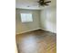 Spacious bedroom with wood-look floors and double closet at 603 Brighton Ct, Norcross, GA 30071