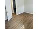 Spacious bedroom with wood-look flooring at 603 Brighton Ct, Norcross, GA 30071