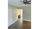 Bright bedroom with wood-look floors and access to bathroom at 603 Brighton Ct, Norcross, GA 30071