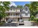 Townhomes with attached garages and landscaping at 581 Cooper Sw St, Atlanta, GA 30312