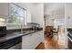 Well-equipped kitchen featuring granite counters and stainless steel appliances at 581 Cooper Sw St, Atlanta, GA 30312