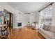 Bright living room with hardwood floors, fireplace, and large windows at 581 Cooper Sw St, Atlanta, GA 30312