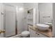 Clean bathroom with updated vanity and walk-in shower at 581 Cooper Sw St, Atlanta, GA 30312