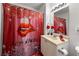 Bathroom with bold shower curtain and vanity at 581 Cooper Sw St, Atlanta, GA 30312