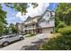 Townhomes with attached garages and landscaping at 581 Cooper Sw St, Atlanta, GA 30312