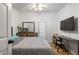 Comfortable bedroom with a queen-size bed and direct access to patio at 581 Cooper Sw St, Atlanta, GA 30312