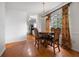 Bright dining area with hardwood floors and view into kitchen at 581 Cooper Sw St, Atlanta, GA 30312