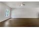 Living room with wood-look floors and a ceiling fan at 2136 Chadwick Sw Rd, Atlanta, GA 30331
