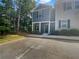 Two-story townhome with gray and blue exterior at 2136 Chadwick Sw Rd, Atlanta, GA 30331