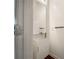 Modern powder room with glass sink and sleek fixtures at 2136 Chadwick Sw Rd, Atlanta, GA 30331