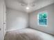 Bright bedroom with carpet and ceiling fan at 2136 Chadwick Sw Rd, Atlanta, GA 30331