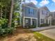 Two-story home with gray siding and landscaping at 2136 Chadwick Sw Rd, Atlanta, GA 30331