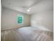 Bright bedroom with carpet and ceiling fan at 2136 Chadwick Sw Rd, Atlanta, GA 30331