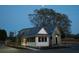 Community building with dark roof and white siding at 19 Hydrangea Unit 71 Way, Auburn, GA 30011