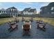 Community fire pit with seating area and gravel at 19 Hydrangea Unit 71 Way, Auburn, GA 30011