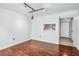 Open living room with hardwood floors and entryway view at 2870 Pharr Court South Nw # 607, Atlanta, GA 30305