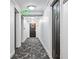 Building hallway with dark doors and carpet flooring at 2870 Pharr Court South Nw # 607, Atlanta, GA 30305