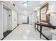 Elegant hallway with tiled floors and ornate mirror at 2870 Pharr Court South Nw # 607, Atlanta, GA 30305