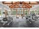 Well-equipped gym with wood beam ceilings and large windows at 2870 Pharr Court South Nw # 607, Atlanta, GA 30305