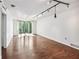 Spacious living room with hardwood floors and large windows at 2870 Pharr Court South Nw # 607, Atlanta, GA 30305