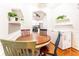 Bright dining area with round table and four chairs, kitchen view at 1850 Cotillion Dr # 3123, Dunwoody, GA 30338