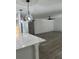 Modern kitchen features white quartz countertops and a barn door at 3503 Larkspur Ter, Decatur, GA 30032