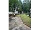 Large backyard with patio, landscaping, and shed at 3503 Larkspur Ter, Decatur, GA 30032
