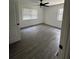 Well-lit bedroom with hardwood floors and a window at 3503 Larkspur Ter, Decatur, GA 30032