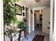 Bright entryway with tiled floor and decorative accents at 574 Glendale Rd, Scottdale, GA 30079