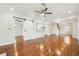 Open living space featuring hardwood floors and a barn door at 1875 Langston Sw Ave, Atlanta, GA 30310