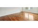 Hardwood floors are featured in this bright bedroom at 1875 Langston Sw Ave, Atlanta, GA 30310