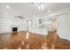 Modern kitchen with white cabinets, quartz countertops, and stainless steel appliances at 1875 Langston Sw Ave, Atlanta, GA 30310