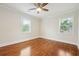 Bright bedroom with hardwood floors and ceiling fan at 1875 Langston Sw Ave, Atlanta, GA 30310