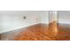Well-lit bedroom with gleaming hardwood floors at 1875 Langston Sw Ave, Atlanta, GA 30310