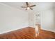 Spacious bedroom with hardwood floors and access to hallway at 1875 Langston Sw Ave, Atlanta, GA 30310