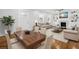 Bright living room with hardwood floors, fireplace, and built-in shelving at 1875 Langston Sw Ave, Atlanta, GA 30310