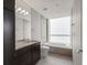 Modern bathroom with soaking tub and granite vanity at 3325 Piedmont Ne Rd # 1801, Atlanta, GA 30305