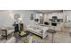 Living room with comfortable seating and view of kitchen at 5142 Longview Run, Decatur, GA 30035