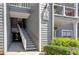 Exterior view showing stairs leading to a condo building entrance at 6209 Santa Fe Pkwy, Sandy Springs, GA 30350