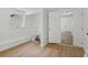 Laundry area with built-in shelving and wood-look flooring at 1410 Elizabeth Sw Ave, Atlanta, GA 30310
