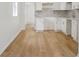 Modern kitchen with white cabinets and mosaic backsplash at 1410 Elizabeth Sw Ave, Atlanta, GA 30310