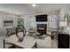 Spacious living room featuring a fireplace and ample natural light at 5150 Longview Run, Decatur, GA 30035